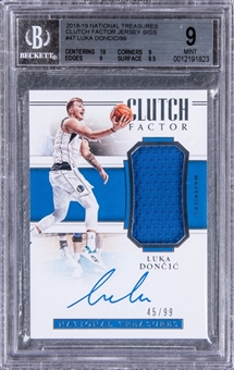 2018-19 Panini National Treasures Clutch Factor Jersey Signatures #47 Luka Doncic Signed Patch Rookie Card (#45/99) - BGS MINT 9/BGS 10
